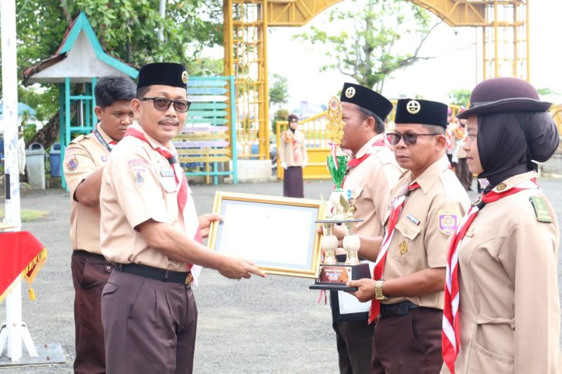 Kwartir Cabang (Kwarcab) Gerakan Pramuka Kabupaten Barito Kuala (Batola) melaksanakan upacara peringatan Hari Pramuka ke-64 Tahun 2025. (Foto: Istimewa)