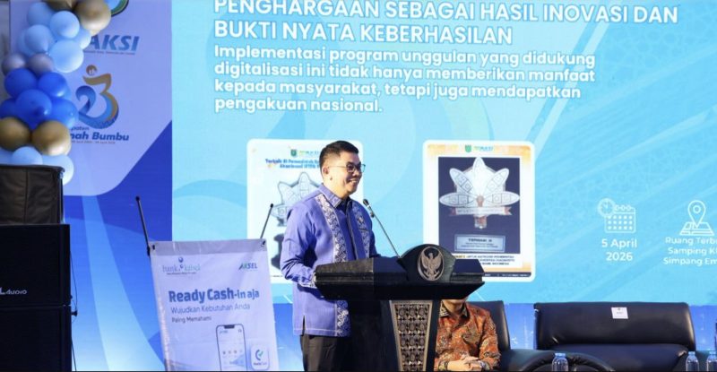 Bupati Tanah Bumbu, Andi Rudi Latif menyampaikan sambutan pada acara High Level Meeting (HLM) Tim Percepatan Perluasan Digitalisasi Daerah (TP2DD) Kabupaten Tanah Bumbu 2026. (Foto: Istimewa)