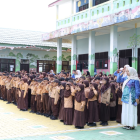 Upacara Peringatan Hari Anak Nasional (HAN) ke-42 Tahun 2026 digelar di SDN 2 Sepunggur, Kecamatan Kusan Tengah. (Foto: Istimewa)