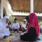 Prosesi pengucapan dua kalimat syahadat tersebut dipandu oleh KH. Achmad Jarni, Pimpinan Pondok Pesantren Darul Falah Batulicin. (Foto: Istimewa)